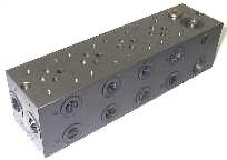 NG06 Subplate for 4 valves + bypass /reliefvalve.